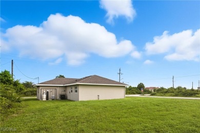 Nestled on a private corner lot, this 3-bedroom, 2-bath home on River Hall Country Club in Florida - for sale on GolfHomes.com, golf home, golf lot
