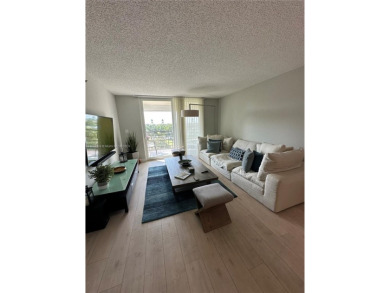 Discover this charming condo with 2 bedrooms and 2 bathrooms on Pembroke Lakes Golf Club in Florida - for sale on GolfHomes.com, golf home, golf lot