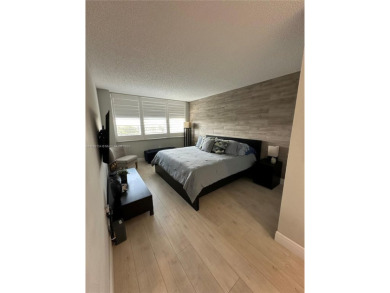 Discover this charming condo with 2 bedrooms and 2 bathrooms on Pembroke Lakes Golf Club in Florida - for sale on GolfHomes.com, golf home, golf lot