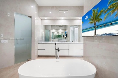 Welcome to the best-positioned residence on Coral Ridge Country on Coral Ridge Country Club in Florida - for sale on GolfHomes.com, golf home, golf lot