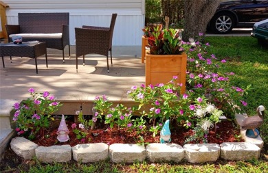 This charming 2022 Factory Expo Direct Park Model sits on one of on Glen Lakes Country Club in Florida - for sale on GolfHomes.com, golf home, golf lot