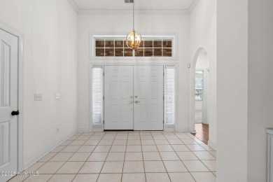 Welcome to this magnificent property offering an array of on Sandpiper Bay Golf and Country Club in North Carolina - for sale on GolfHomes.com, golf home, golf lot