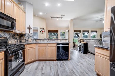 ASSUMABLE loan option for qualified buyers. Tucked inside the on Woodbridge Golf Club in Texas - for sale on GolfHomes.com, golf home, golf lot