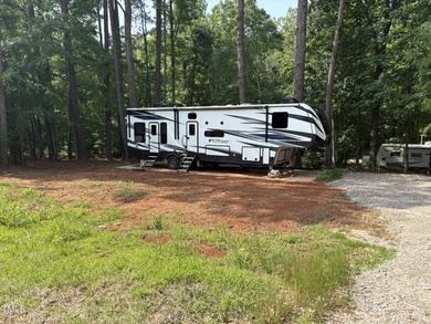Beautiful cleared multi-use lot on the south side of Lake Royale on River Golf and County Club at Lake Royale in North Carolina - for sale on GolfHomes.com, golf home, golf lot