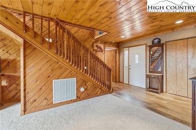 This property has it all! GREAT LOCATION, SWEEPING LONG RANGE on Beech Mountain Club in North Carolina - for sale on GolfHomes.com, golf home, golf lot