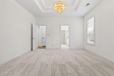 Welcome to this magnificent property offering an array of on Sandpiper Bay Golf and Country Club in North Carolina - for sale on GolfHomes.com, golf home, golf lot