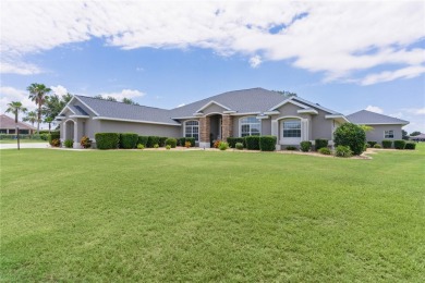 STUNNING GOLF FRONT OASIS WITH RESORT-STYLE OUTDOOR LIVING on Miona Lake Golf Club in Florida - for sale on GolfHomes.com, golf home, golf lot