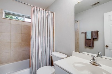 ASSUMABLE loan option for qualified buyers. Tucked inside the on Woodbridge Golf Club in Texas - for sale on GolfHomes.com, golf home, golf lot