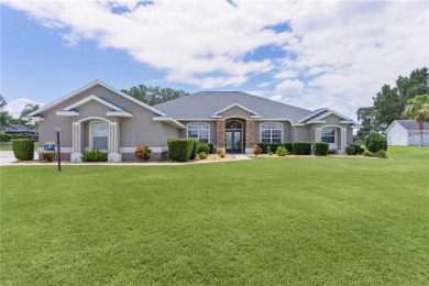 STUNNING GOLF FRONT OASIS WITH RESORT-STYLE OUTDOOR LIVING on Miona Lake Golf Club in Florida - for sale on GolfHomes.com, golf home, golf lot