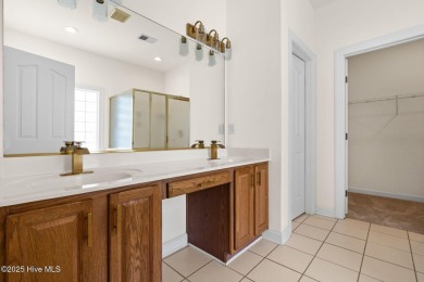 Welcome to this magnificent property offering an array of on Sandpiper Bay Golf and Country Club in North Carolina - for sale on GolfHomes.com, golf home, golf lot