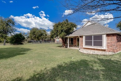 ASSUMABLE loan option for qualified buyers. Tucked inside the on Woodbridge Golf Club in Texas - for sale on GolfHomes.com, golf home, golf lot