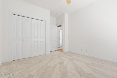 Welcome to this magnificent property offering an array of on Sandpiper Bay Golf and Country Club in North Carolina - for sale on GolfHomes.com, golf home, golf lot