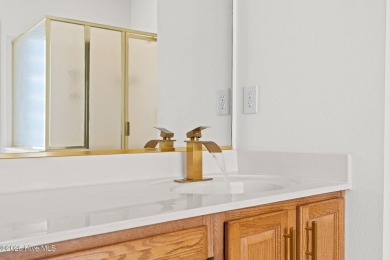 Welcome to this magnificent property offering an array of on Sandpiper Bay Golf and Country Club in North Carolina - for sale on GolfHomes.com, golf home, golf lot