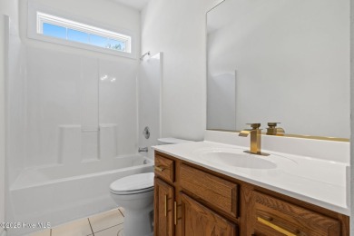 Welcome to this magnificent property offering an array of on Sandpiper Bay Golf and Country Club in North Carolina - for sale on GolfHomes.com, golf home, golf lot
