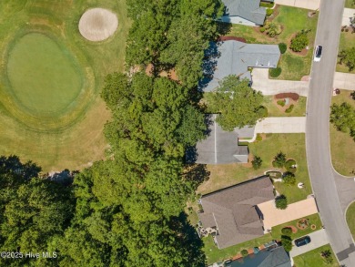 Welcome to this magnificent property offering an array of on Sandpiper Bay Golf and Country Club in North Carolina - for sale on GolfHomes.com, golf home, golf lot