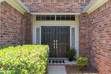 Welcome to this magnificent property offering an array of on Sandpiper Bay Golf and Country Club in North Carolina - for sale on GolfHomes.com, golf home, golf lot