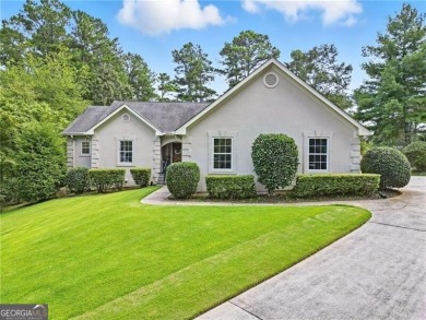 Enjoy country club living in this beautifully updated 3-bedroom on Fairfield Plantation Golf and Country Club in Georgia - for sale on GolfHomes.com, golf home, golf lot