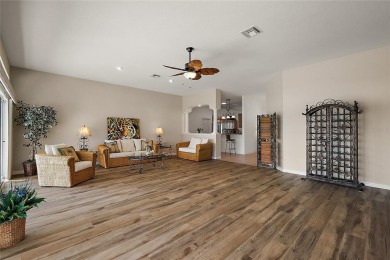 ENJOY SPECTACULAR, PANORAMIC, WATERFRONT VIEWS in this 3/2 on El Diablo Executive Golf Course in Florida - for sale on GolfHomes.com, golf home, golf lot