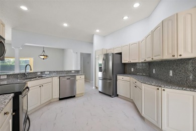 STUNNINGLY UPDATED, GOLF FRONT, 3/2 BLOCK and STUCCO Magnolia on The Links of Spruce Creek in Florida - for sale on GolfHomes.com, golf home, golf lot