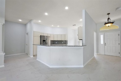 STUNNINGLY UPDATED, GOLF FRONT, 3/2 BLOCK and STUCCO Magnolia on The Links of Spruce Creek in Florida - for sale on GolfHomes.com, golf home, golf lot