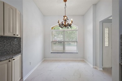 STUNNINGLY UPDATED, GOLF FRONT, 3/2 BLOCK and STUCCO Magnolia on The Links of Spruce Creek in Florida - for sale on GolfHomes.com, golf home, golf lot