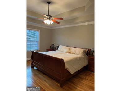 This beautiful home in sought after Fairfield Plantation boasts on Fairfield Plantation Golf and Country Club in Georgia - for sale on GolfHomes.com, golf home, golf lot