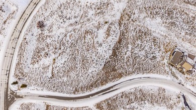 Set the stage for your future in a setting where wide-open space on Headwaters Golf Course At Granby Ranch in Colorado - for sale on GolfHomes.com, golf home, golf lot