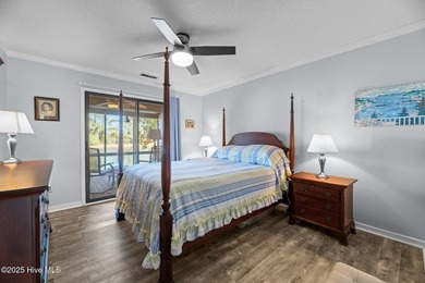 Captivating water views from almost every room in this 2-bedroom on Harbour Point Golf Club in North Carolina - for sale on GolfHomes.com, golf home, golf lot