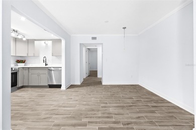 FANTASTIC, COMPLETELY REMODELED GROUND-FLOOR CONDO -- STEPS TO on Treasure Bay Golf and Tennis in Florida - for sale on GolfHomes.com, golf home, golf lot