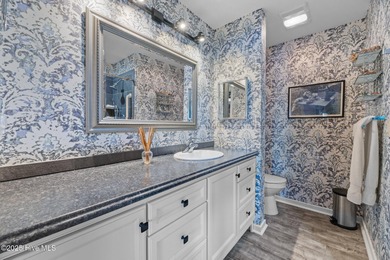 Captivating water views from almost every room in this 2-bedroom on Harbour Point Golf Club in North Carolina - for sale on GolfHomes.com, golf home, golf lot