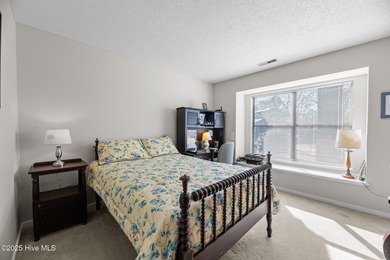 Captivating water views from almost every room in this 2-bedroom on Harbour Point Golf Club in North Carolina - for sale on GolfHomes.com, golf home, golf lot