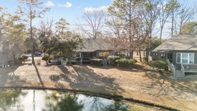 Captivating water views from almost every room in this 2-bedroom on Harbour Point Golf Club in North Carolina - for sale on GolfHomes.com, golf home, golf lot