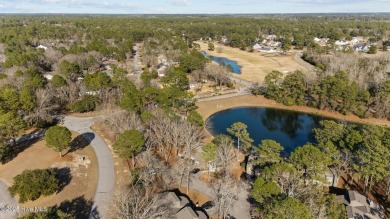 Captivating water views from almost every room in this 2-bedroom on Harbour Point Golf Club in North Carolina - for sale on GolfHomes.com, golf home, golf lot