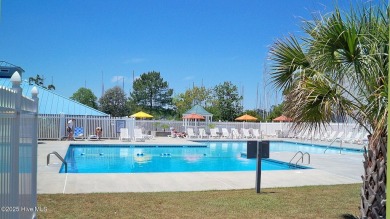 Captivating water views from almost every room in this 2-bedroom on Harbour Point Golf Club in North Carolina - for sale on GolfHomes.com, golf home, golf lot