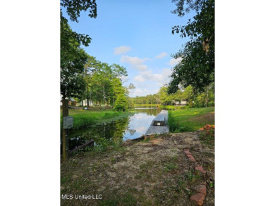 Waterfront living in Lake Hilldale! Built with views in mind on The Kings Arrow Ranch in Mississippi - for sale on GolfHomes.com, golf home, golf lot