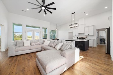 Discover luxury living at 7702 Feather Bay Dr, where new on Hideout Golf Club and Resort  in Texas - for sale on GolfHomes.com, golf home, golf lot