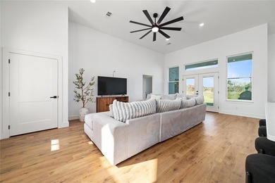 Discover luxury living at 7702 Feather Bay Dr, where new on Hideout Golf Club and Resort  in Texas - for sale on GolfHomes.com, golf home, golf lot