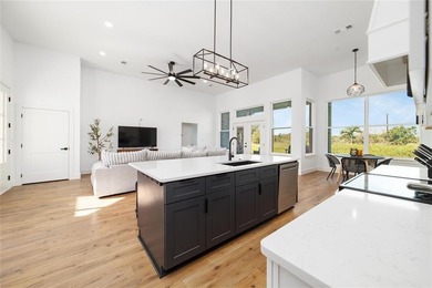 Discover luxury living at 7702 Feather Bay Dr, where new on Hideout Golf Club and Resort  in Texas - for sale on GolfHomes.com, golf home, golf lot