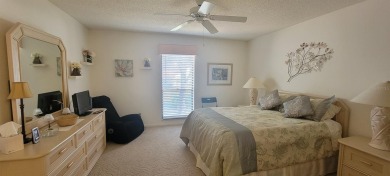 Beautiful end unit condo, located on tranquil pond with serene on Tarpon Woods Golf Club in Florida - for sale on GolfHomes.com, golf home, golf lot