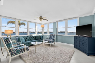 Welcome to waterfront living at its finest in Point Brittany; on Isla Del Sol Yacht and Country Club in Florida - for sale on GolfHomes.com, golf home, golf lot