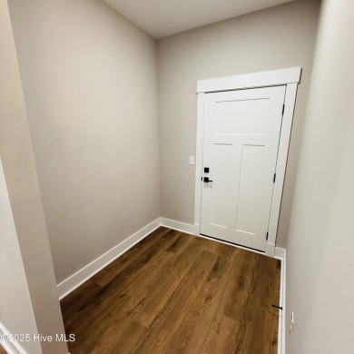 Welcome to your dream home! This stunning new construction on Chowan Golf and Country Club in North Carolina - for sale on GolfHomes.com, golf home, golf lot