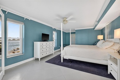 Welcome to waterfront living at its finest in Point Brittany; on Isla Del Sol Yacht and Country Club in Florida - for sale on GolfHomes.com, golf home, golf lot