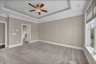 Exceptional curb appeal defines this beautifully designed on Cape Fear National At Brunswick Forest in North Carolina - for sale on GolfHomes.com, golf home, golf lot