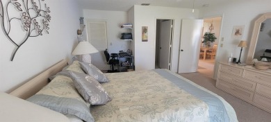Beautiful end unit condo, located on tranquil pond with serene on Tarpon Woods Golf Club in Florida - for sale on GolfHomes.com, golf home, golf lot