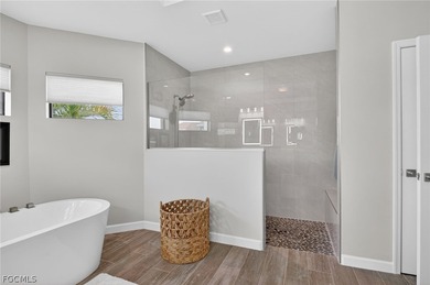 Lakefront Custom Pool Home (built 2023), offering the perfect on Del Tura Golf and Country Club in Florida - for sale on GolfHomes.com, golf home, golf lot