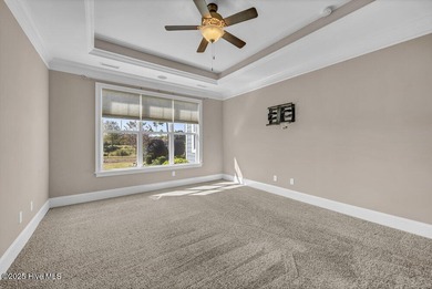 Exceptional curb appeal defines this beautifully designed on Cape Fear National At Brunswick Forest in North Carolina - for sale on GolfHomes.com, golf home, golf lot