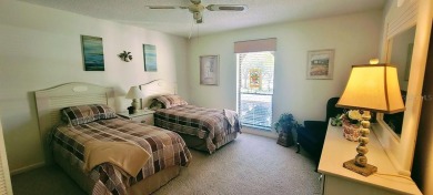 Beautiful end unit condo, located on tranquil pond with serene on Tarpon Woods Golf Club in Florida - for sale on GolfHomes.com, golf home, golf lot