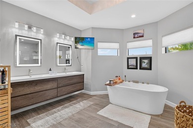 Lakefront Custom Pool Home (built 2023), offering the perfect on Del Tura Golf and Country Club in Florida - for sale on GolfHomes.com, golf home, golf lot