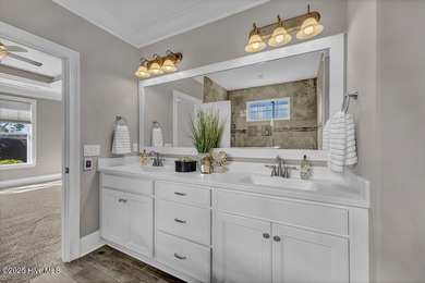 Exceptional curb appeal defines this beautifully designed on Cape Fear National At Brunswick Forest in North Carolina - for sale on GolfHomes.com, golf home, golf lot