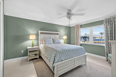 Welcome to waterfront living at its finest in Point Brittany; on Isla Del Sol Yacht and Country Club in Florida - for sale on GolfHomes.com, golf home, golf lot